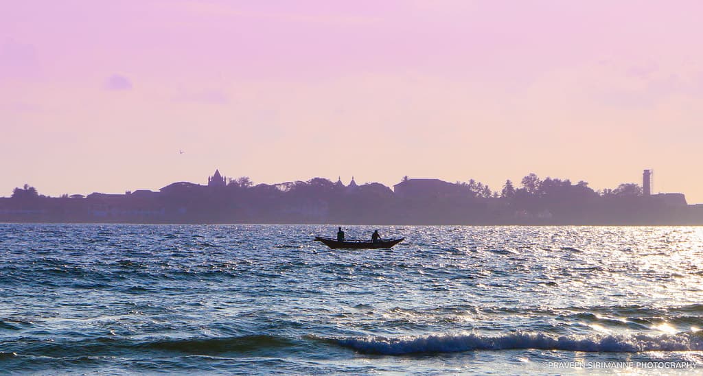 Fishermen in the sea of Weligama, Sri lanka